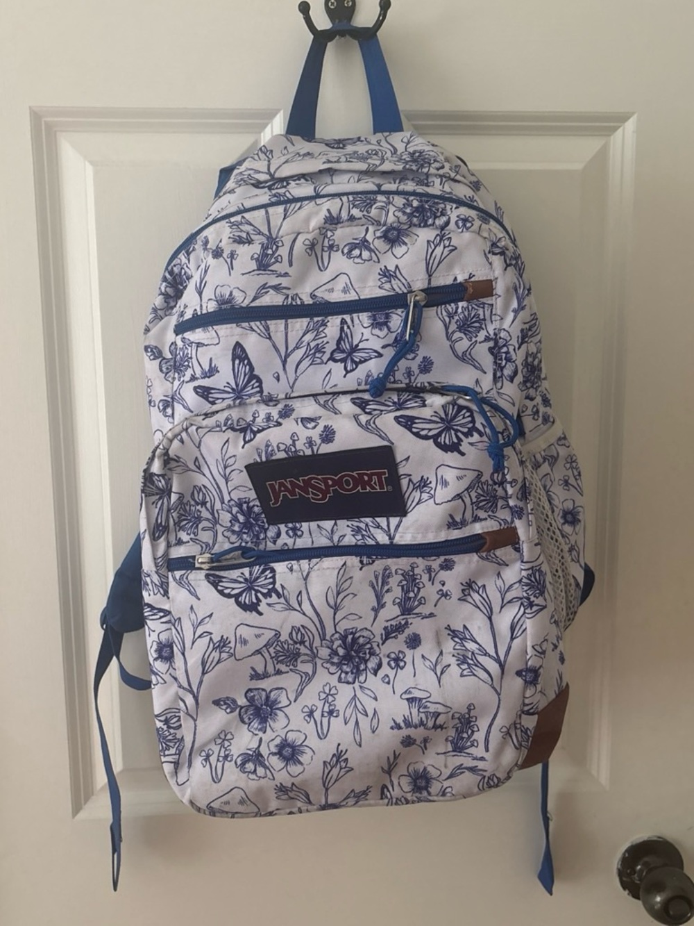 Jansport White Backpack with Blue Floral & Butterfly Print